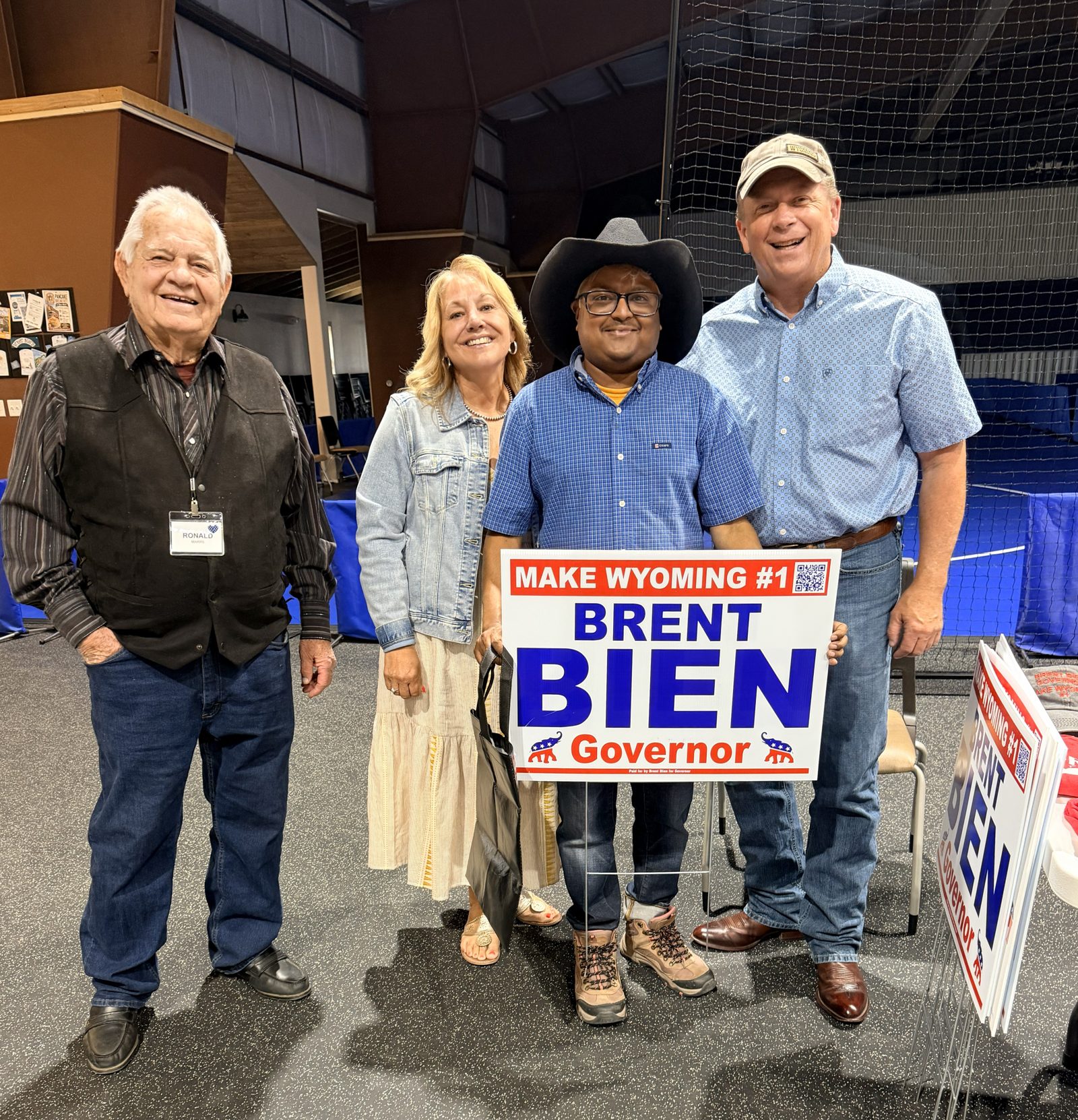 Wyoming supporters holding a Brent Bien for Governor Make Wyoming #1 yard sign